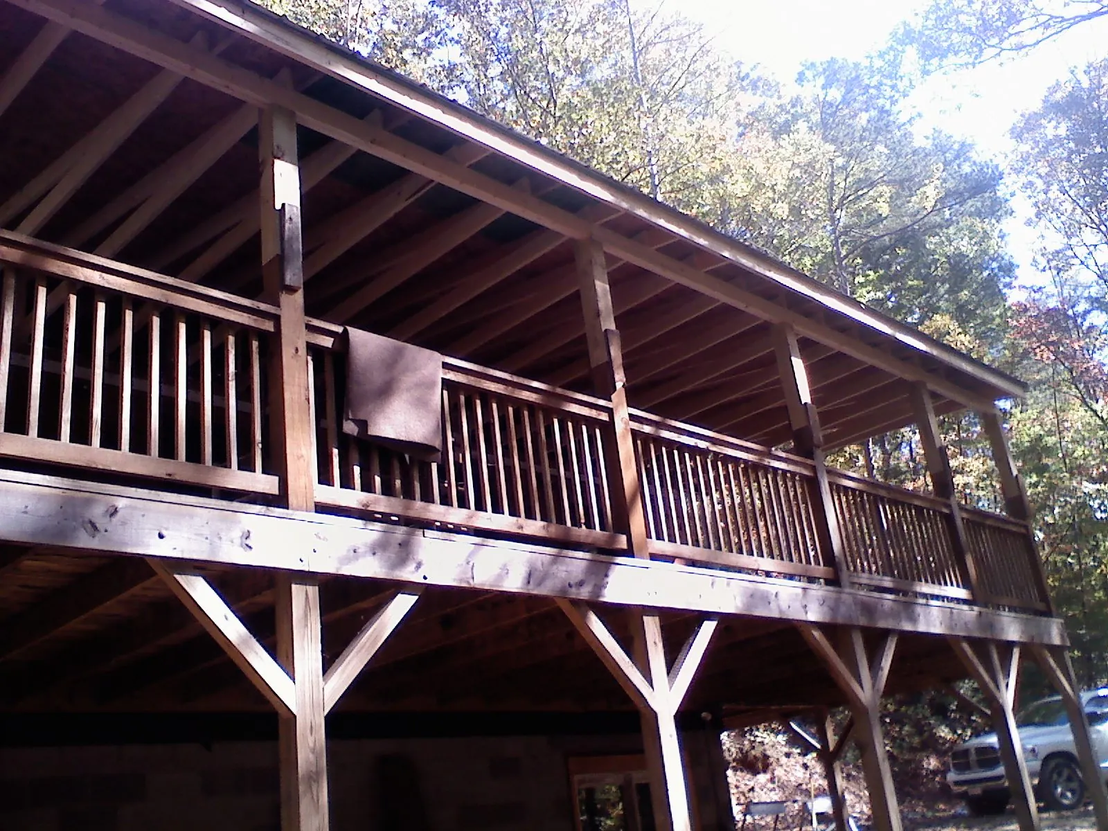 Timber framing under a new elevated porch and deck — Roof Leak Repair in Allons by Roofing Brothers